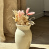 Vase à bords fleuris
